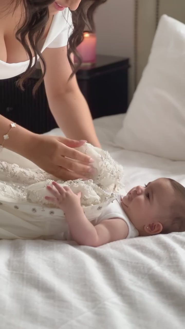 Tania created a stunning christening gown for our princess! The quality and details were flawless. She was a pleasure to work with—so professional and accommodating. Despite short notice, she exceeded our expectations. Truly grateful for her craftsmanship and service!